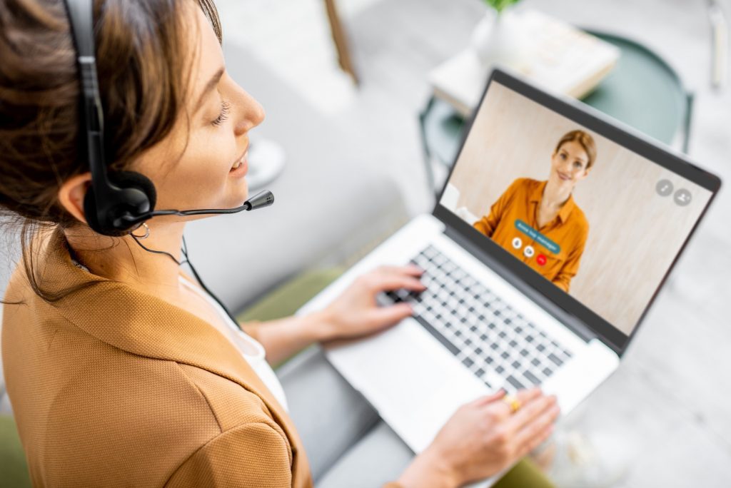 Business woman having a video call with coworker